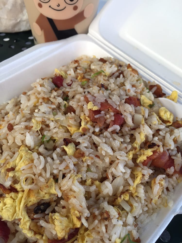 Fried rice with Taiwanese sausage and egg in a to-go box
